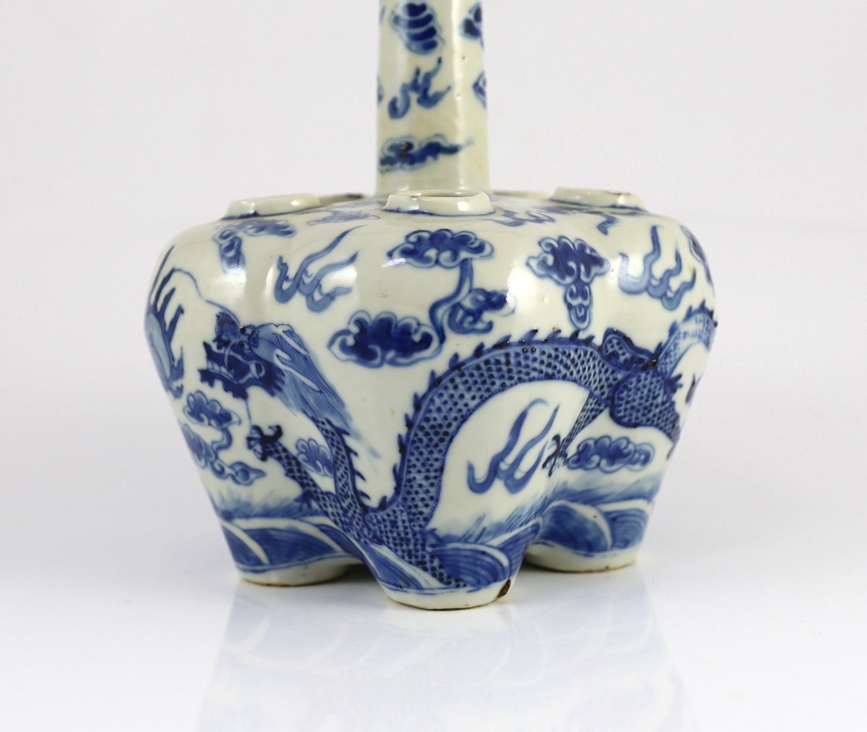 A Chinese blue and white ’dragon’ tulip vase, 19th century, 25cm high, splinter chips